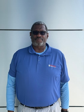 Staff member John "Big John" Jacobs from ID_1e508c