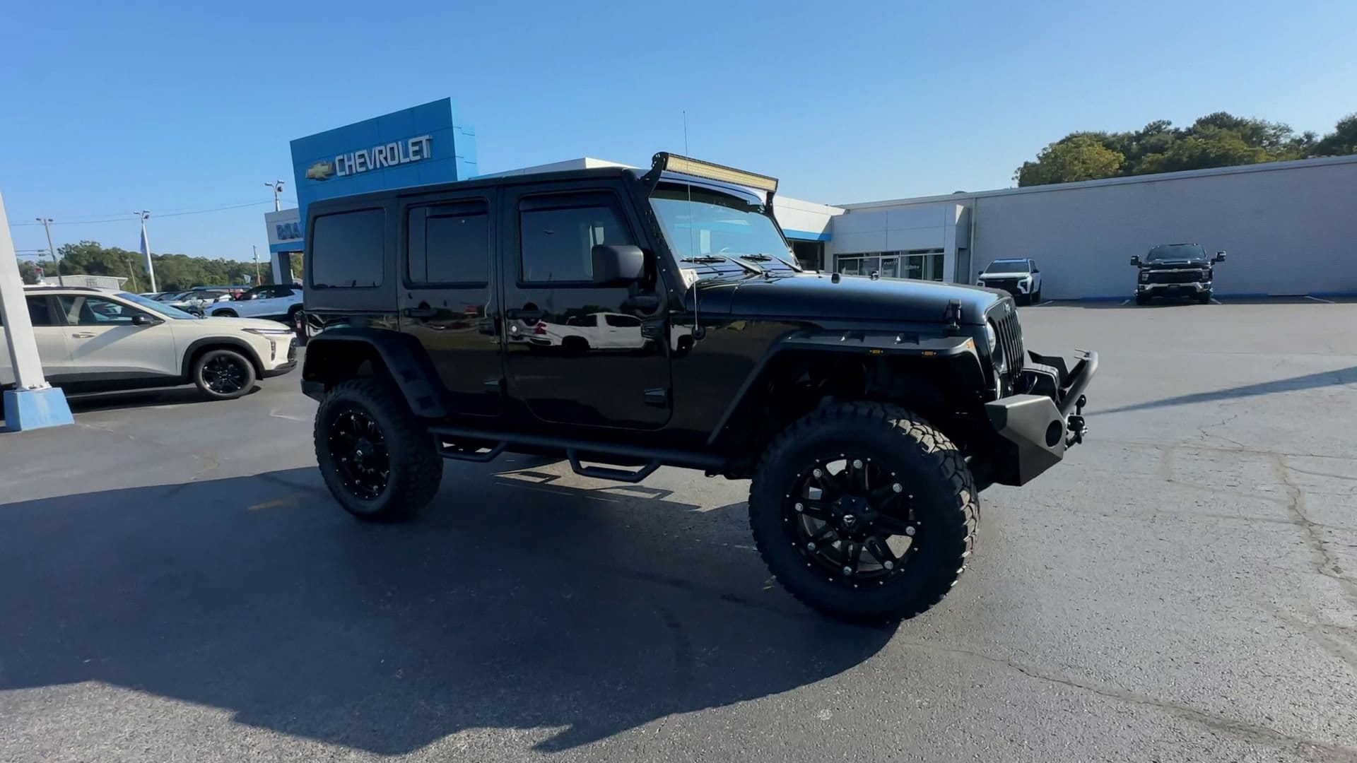 Used 2015 Jeep Wrangler Unlimited Sport with VIN 1C4BJWDG0FL759111 for sale in Boaz, AL