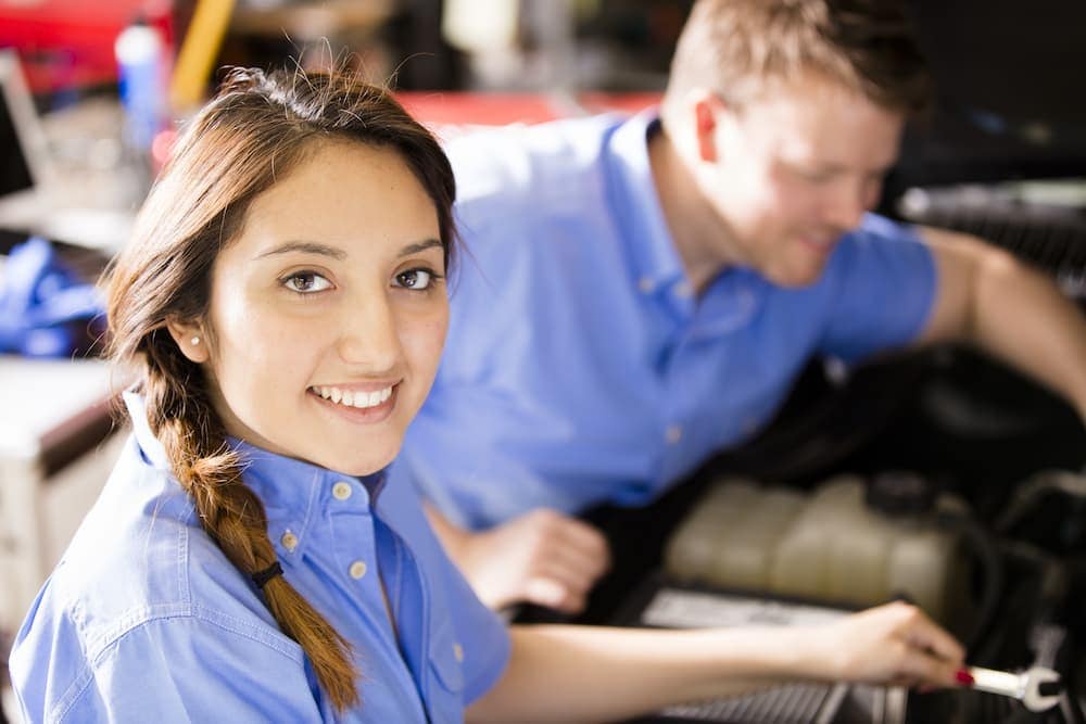 Careers at Chevrolet of Wasilla A person handing car keys to another person.