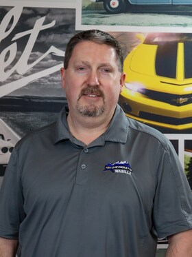 Staff member Christopher Bills from ID_571f9dc991aa