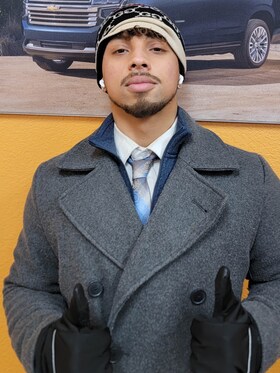 Staff member Que Masanes from ID_8c44b98276bb