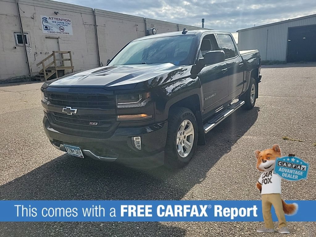 Used 2018 Chevrolet Silverado 1500 LT Z71 with VIN 3GCUKREC1JG589608 for sale in Wayzata, Minnesota