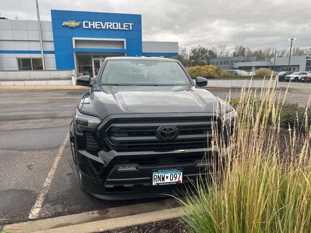 Used 2024 Toyota Tacoma SR5 with VIN 3TMLB5JN5RM009642 for sale in Wayzata, Minnesota