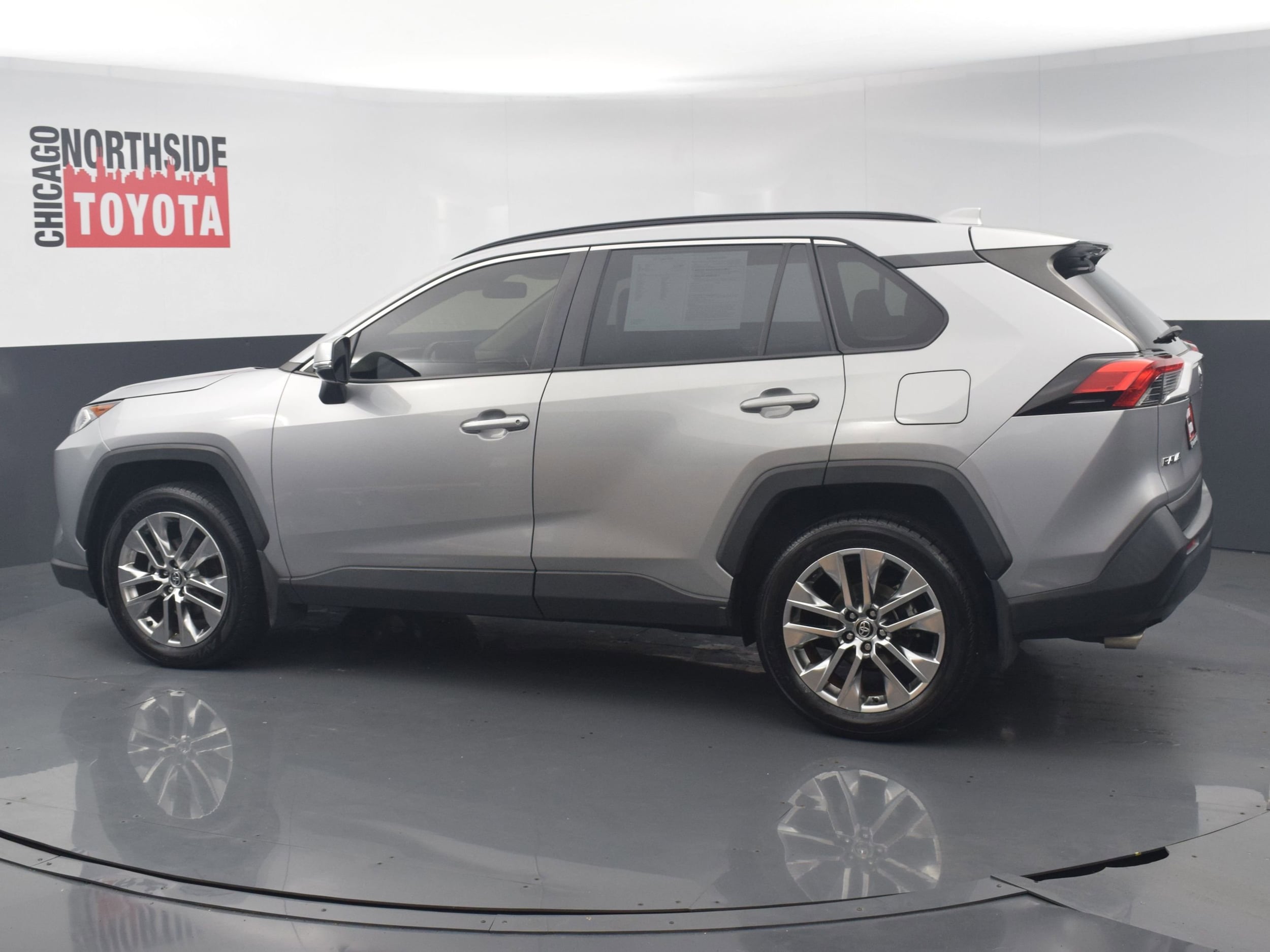 Used 2021 Toyota RAV4 XLE Premium with VIN JTMA1RFV4MD077199 for sale in Chicago, IL