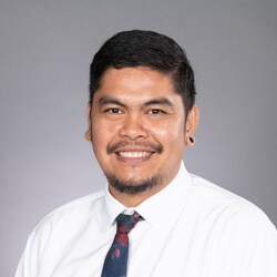 Staff member Lawrence Santos from ID_1fe10cef2f65
