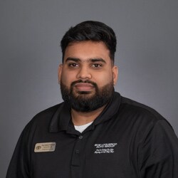 Staff member Wehaj Rehman from ID_5a7522d733b5