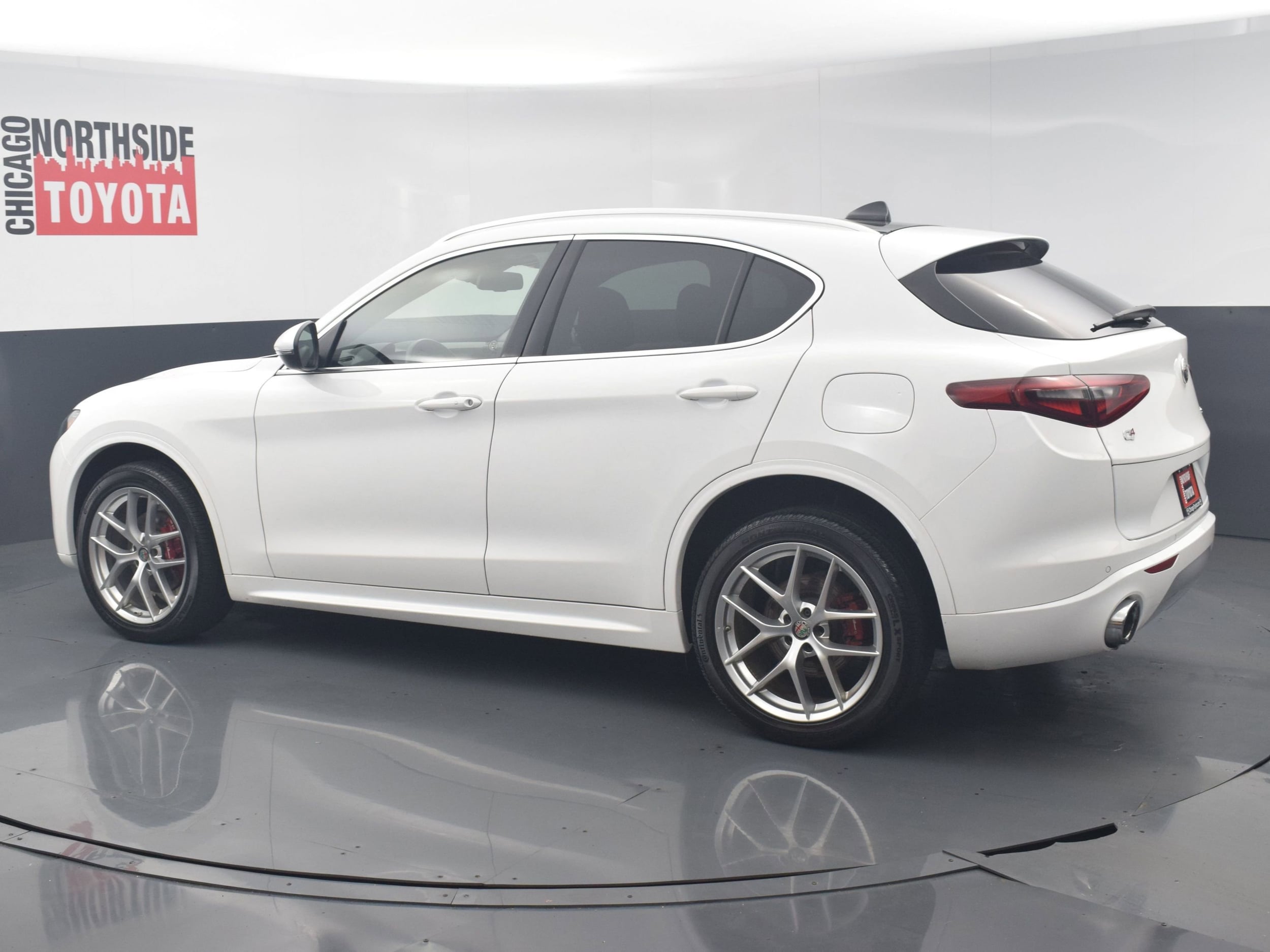 Used 2021 Alfa Romeo Stelvio Ti with VIN ZASPAKBNXM7D19927 for sale in Chicago, IL