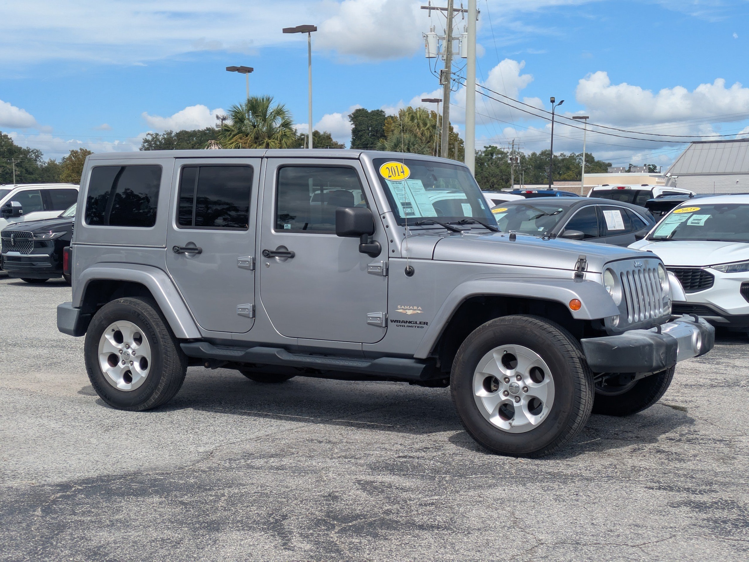 Used 2014 Jeep Wrangler Unlimited Sahara with VIN 1C4BJWEG0EL197207 for sale in Chiefland, FL
