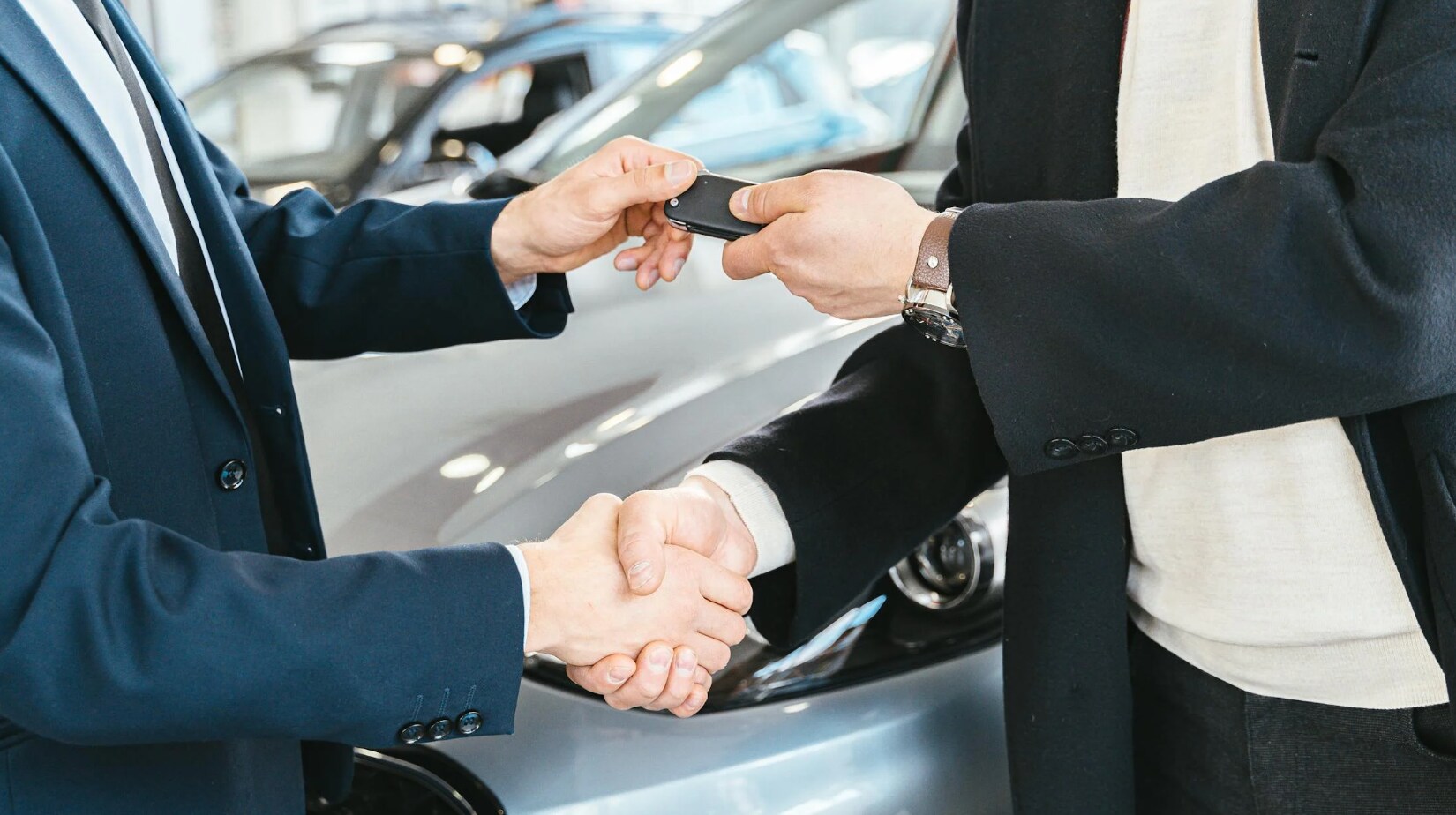 Person purchasing a car at a dealership