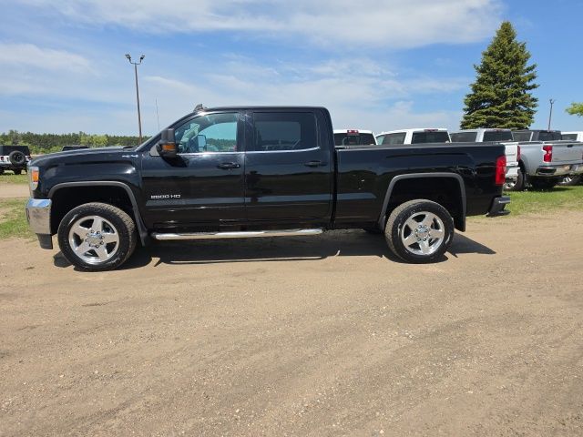 Used 2015 GMC Sierra 2500HD SLE with VIN 1GT12YEG6FF657099 for sale in Fertile, Minnesota