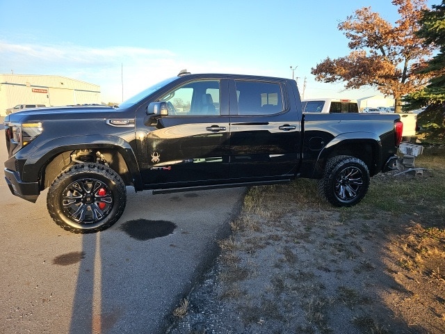 Used 2022 GMC Sierra 1500 AT4 with VIN 1GTPUEELXNZ599950 for sale in Fertile, Minnesota