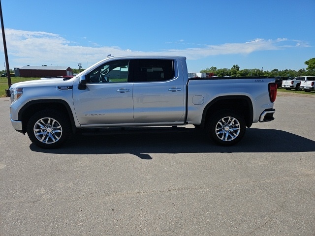 Used 2021 GMC Sierra 1500 SLT with VIN 1GTU9DET0MZ221617 for sale in Fertile, Minnesota