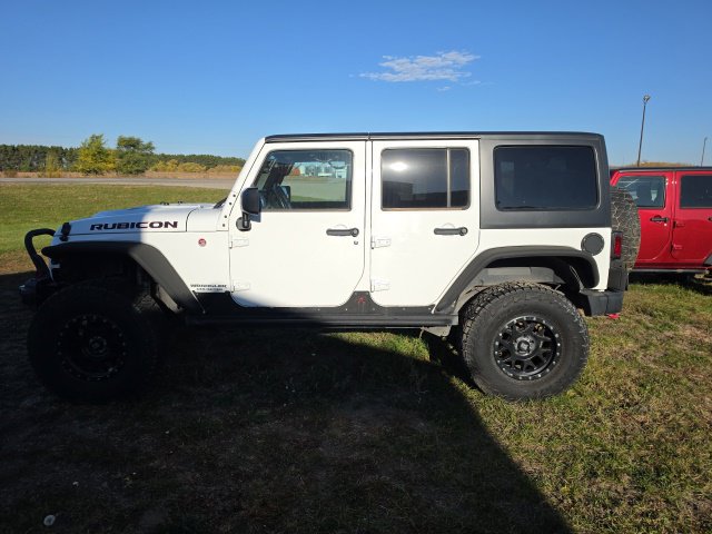 Used 2016 Jeep Wrangler Unlimited Rubicon with VIN 1C4BJWFG0GL346958 for sale in Fertile, Minnesota