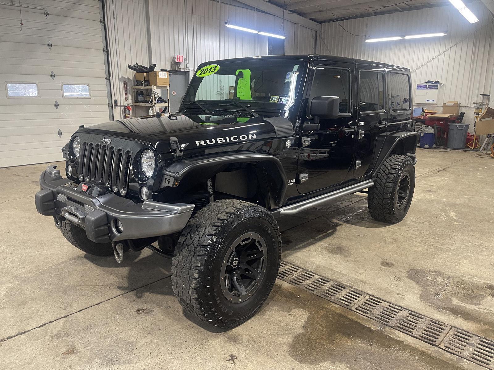 Used 2013 Jeep Wrangler Unlimited Rubicon with VIN 1C4HJWFG2DL527808 for sale in Titusville, PA