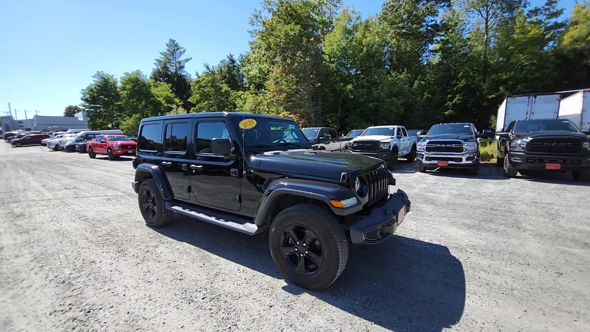 Used 2019 Jeep Wrangler Unlimited Sahara Altitude with VIN 1C4HJXEG8KW676260 for sale in Claremont, NH