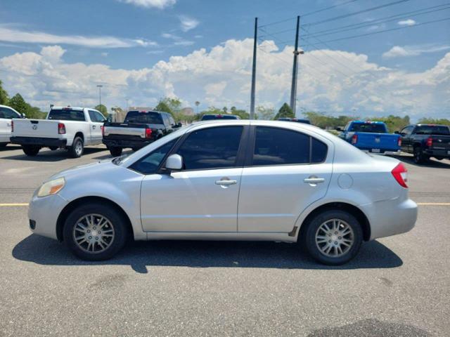 Used 2013 Suzuki SX4 Sedan LE with VIN JS2YC5A34D6101969 for sale in Sanford, FL