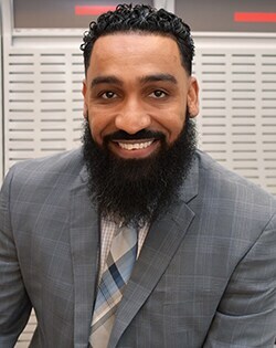 Staff member Manny Ribeiro from ID_c9876259650b