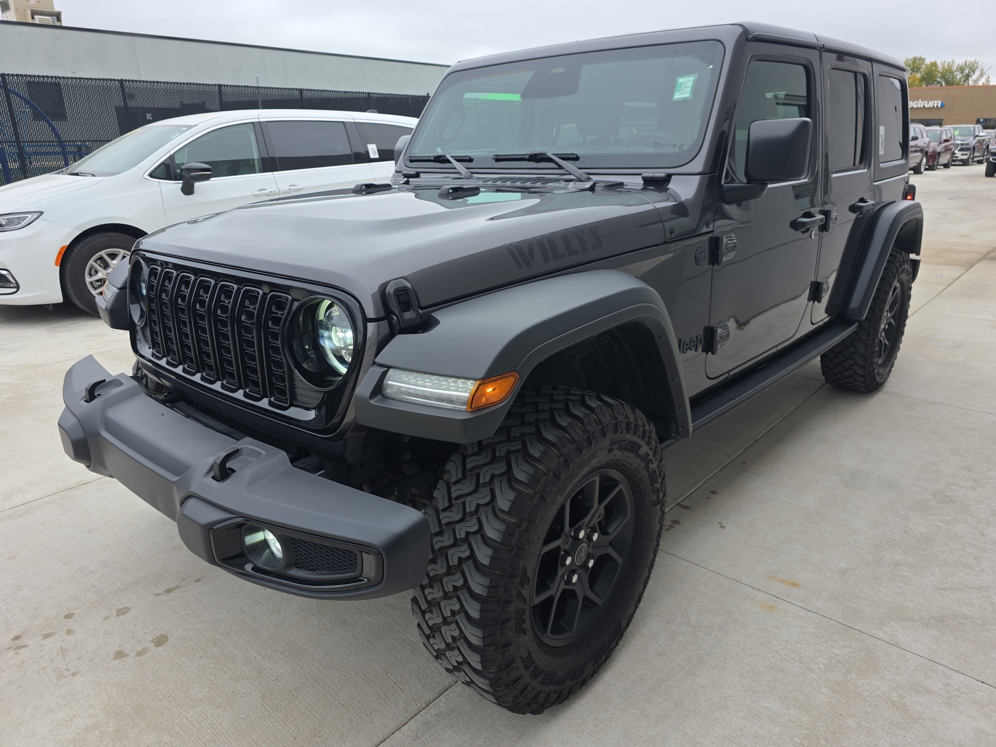 Used 2025 Jeep Wrangler 4-Door Willys with VIN 1C4PJXDN7SW653435 for sale in Winona, Minnesota