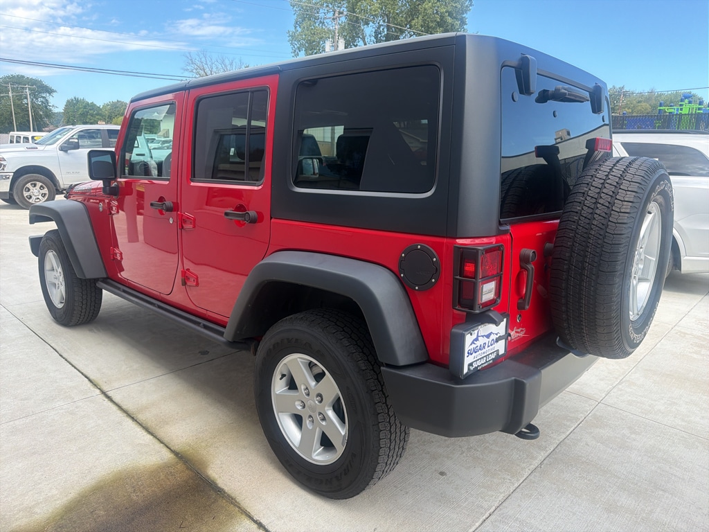 Used 2016 Jeep Wrangler Unlimited Black Bear with VIN 1C4BJWDG2GL166089 for sale in Winona, Minnesota