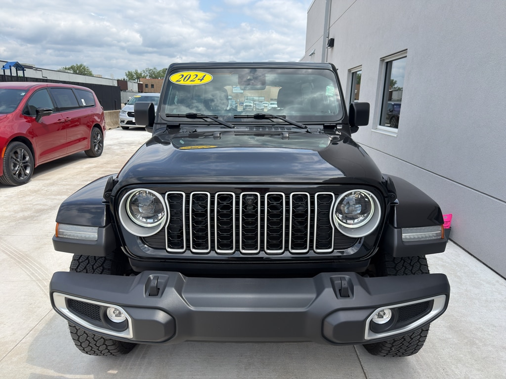 Used 2024 Jeep Wrangler 4-Door Sahara with VIN 1C4PJXEG6RW306110 for sale in Winona, Minnesota