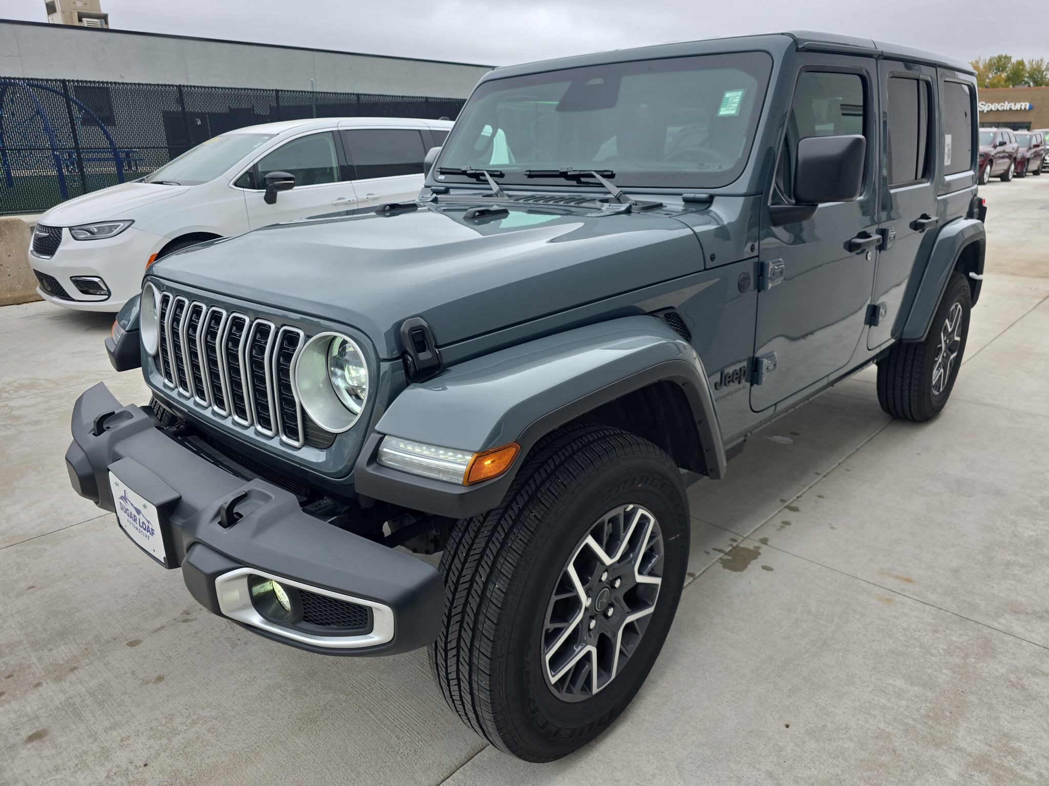 Used 2026 Jeep Wrangler 4-Door Sahara with VIN 1C4PJXEN0TW253684 for sale in Winona, Minnesota