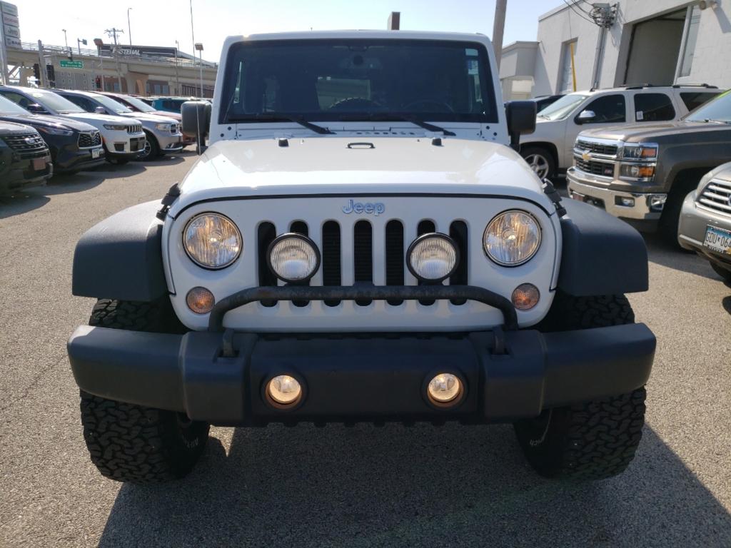 Used 2014 Jeep Wrangler Unlimited Rubicon with VIN 1C4BJWFG7EL180192 for sale in Winona, Minnesota