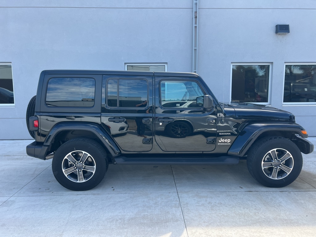 Used 2023 Jeep Wrangler 4-Door Sahara with VIN 1C4HJXEG4PW695363 for sale in Winona, Minnesota