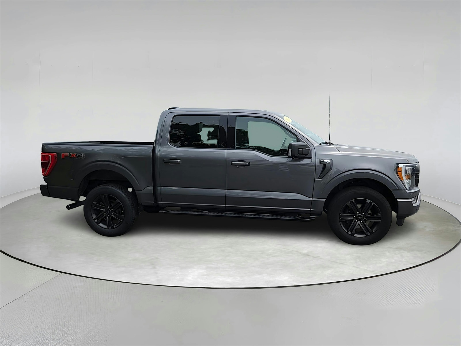 Used 2021 Ford F-150 XLT with VIN 1FTFW1E80MFC31111 for sale in Kansas City