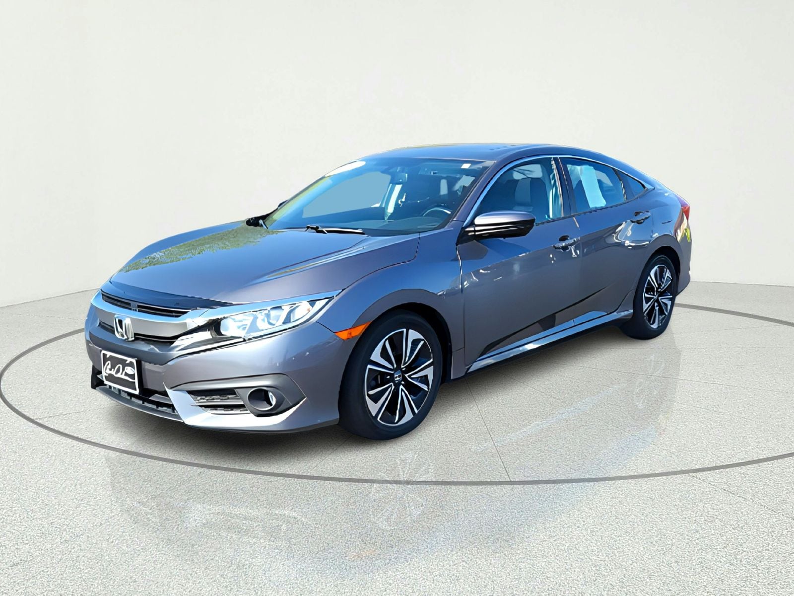 Used 2017 Honda Civic EX-L with VIN 19XFC1F73HE001268 for sale in Excelsior Springs, MO