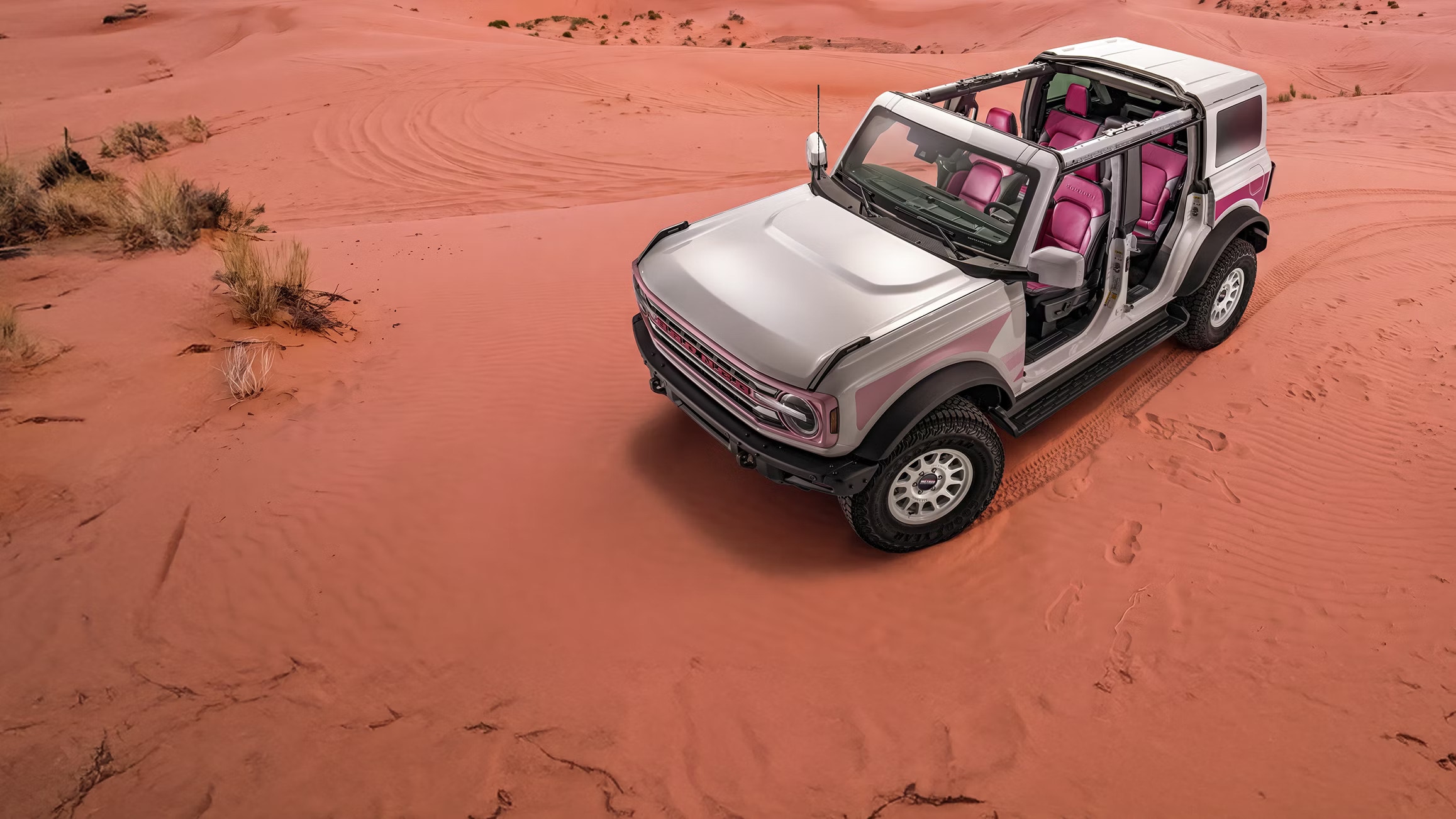 Ford Bronco Desert Rising Method wheels and custom graphics