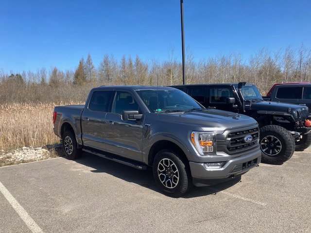 Used 2022 Ford F-150 XLT with VIN 1FTEW1EP7NFC06727 for sale in Manistique, MI