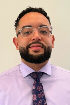 Staff member Carlos Rocha Jr. from ID_ef074b