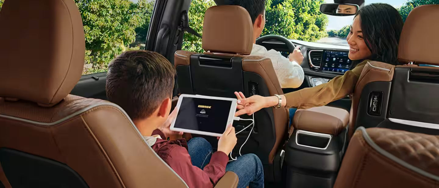 Family Sitting in Chrysler