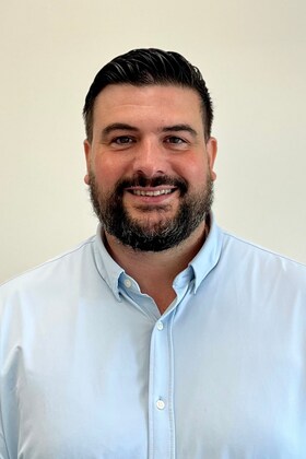 Staff member Zachary Bly from ID_899e93710584
