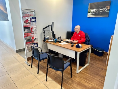 Ford Employee at desk