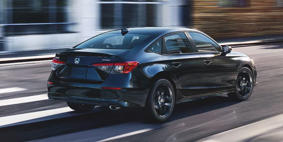 2024 Honda Civic Driving down Street