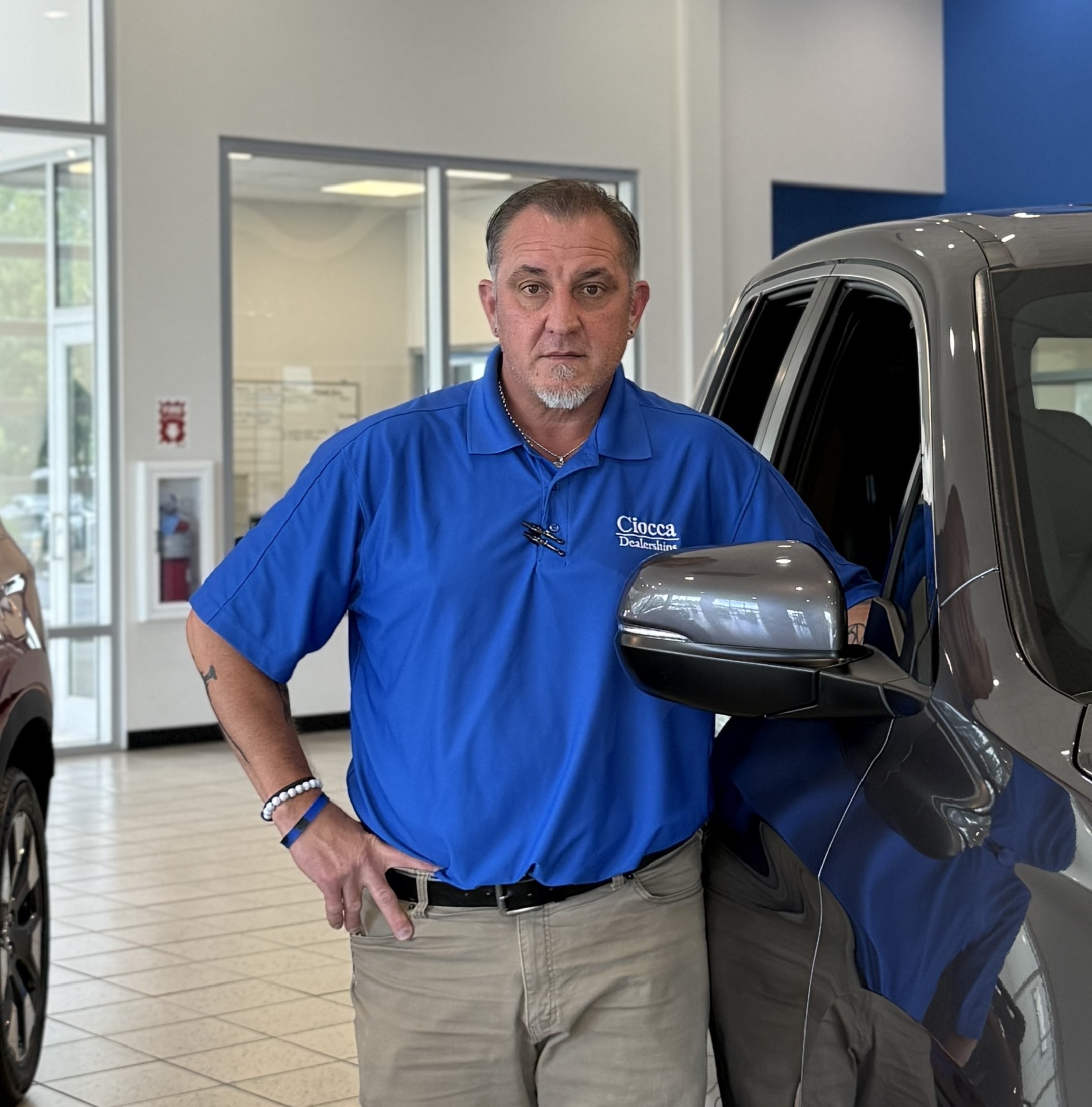 Staff member Dennis Christiana from ID_559e159b7447