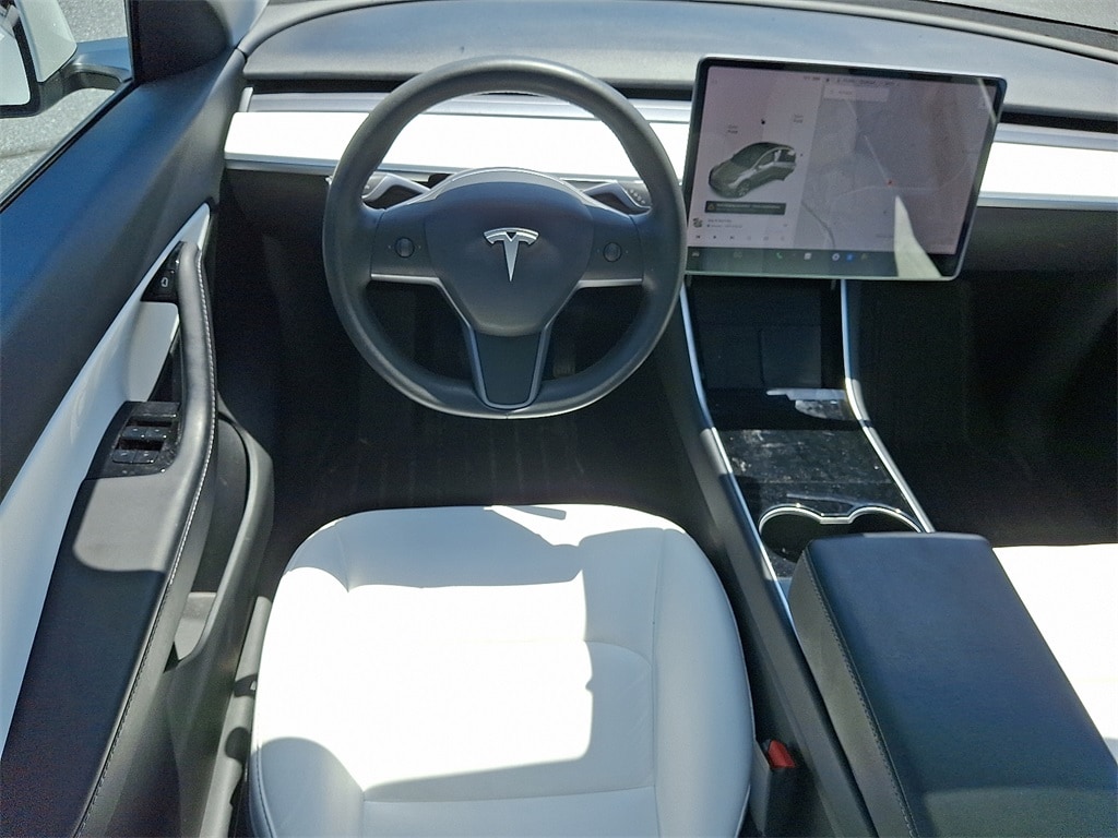 Used 2021 Tesla Model Y Long Range with VIN 5YJYGDEE0MF063004 for sale in Kansas City