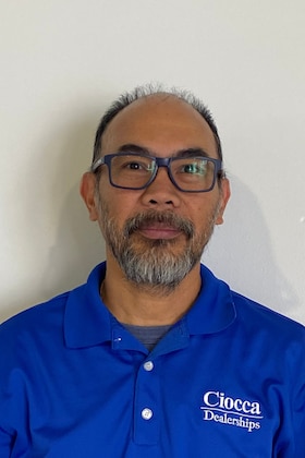 Staff member Henry Casas from ID_f57ac4f4ce3a