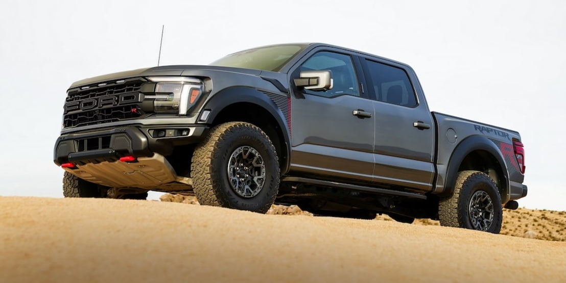 A gray 2026 Ford F-150 truck parked on top of a sand dune