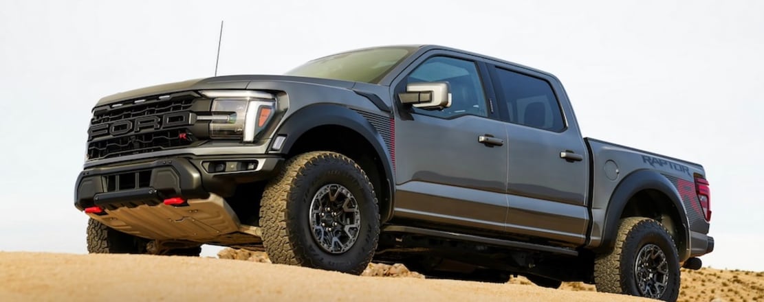 A gray 2026 Ford F-150 pickup truck parked on a sand dune