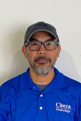 Staff member Henry Casas from ID_0eec7e856da2