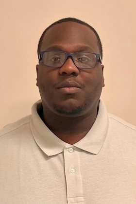 Staff member Omenshah Davis from ID_775e7c66d774