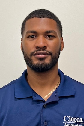 Staff member Elvis Arache from ID_775e7c66d774