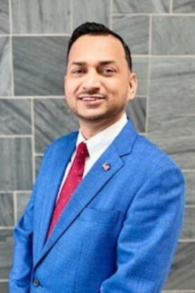 Staff member Mo Masud from ID_4510e6f13f1b