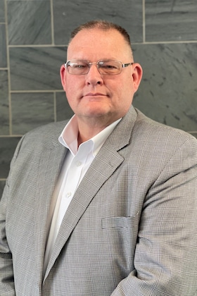 Staff member Mike Mclaughlin from ID_b48582728576