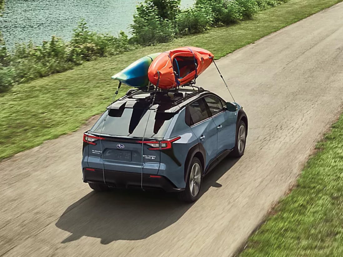 Solterra driving with canoes on top
