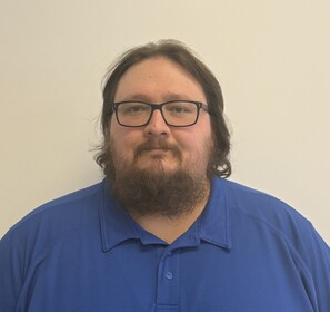 Staff member Joshua Fisher from ID_bdaf0aecf4de