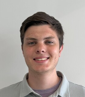Staff member Ty Guelich from ID_09f2a8f7e245