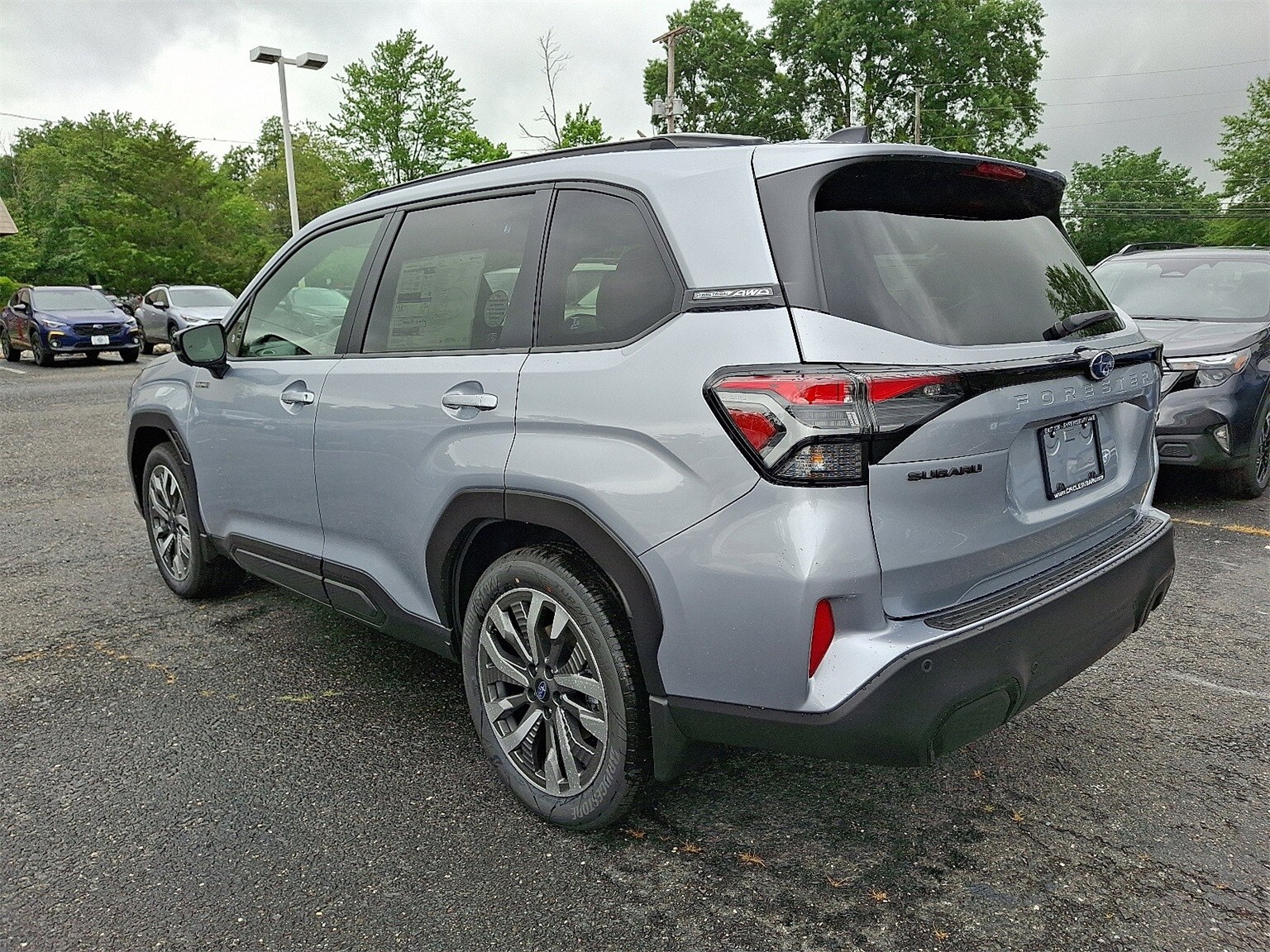 2025 Subaru Forester Touring photo 2